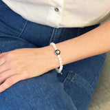 stainless steel charm detail on celestial light bracelet