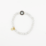 lunar gleam bracelet in gold with natural white shell beads, full bracelet view