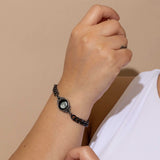 3mm moon charm detail while worn, classic pewter bracelet